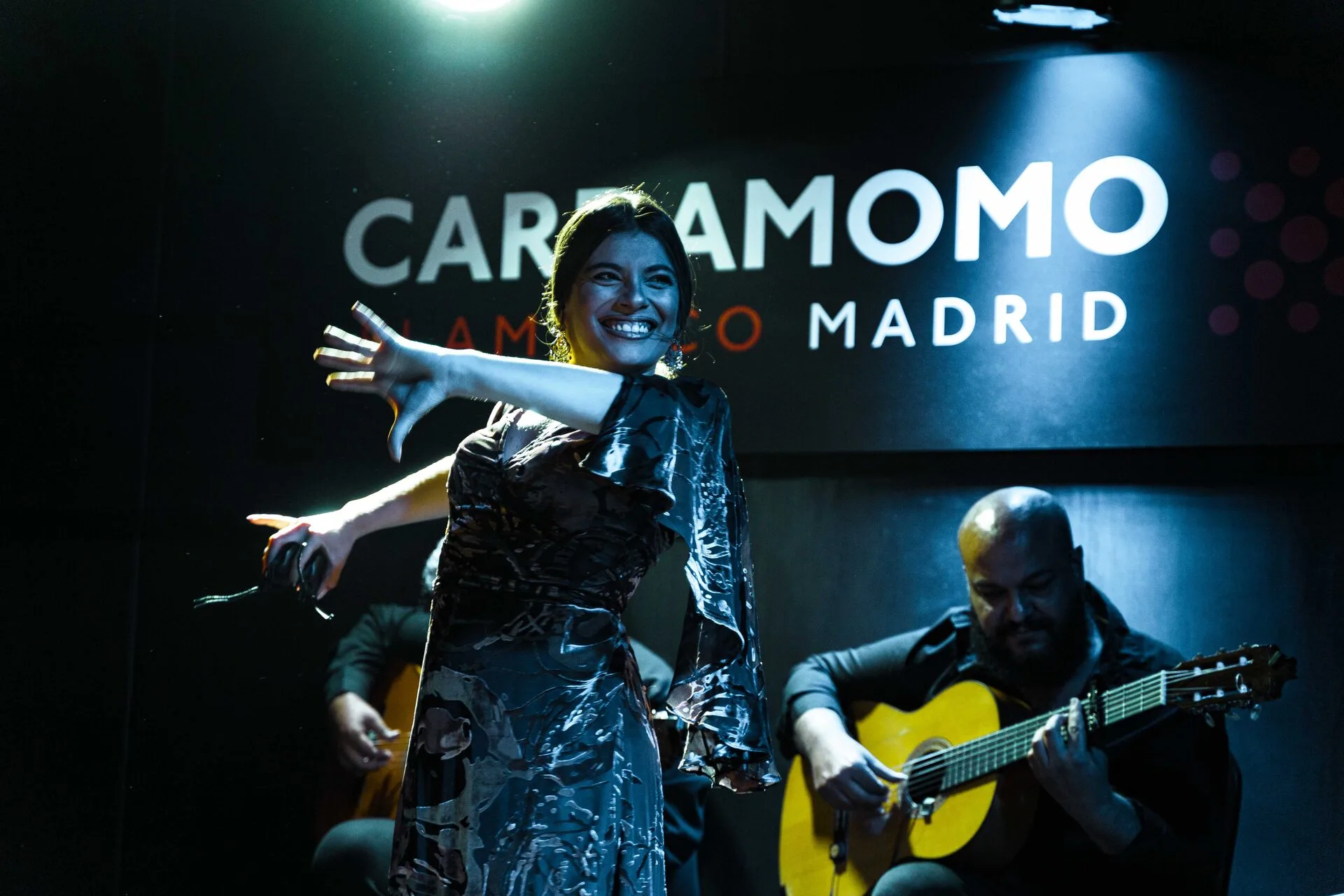 Flamenco guitarist and dancer performing live in Madrid
